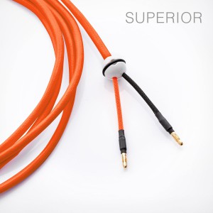 Loudspeaker cable, handmade, textile cabel with porcelain ball cable splitter and banans, neon orange.