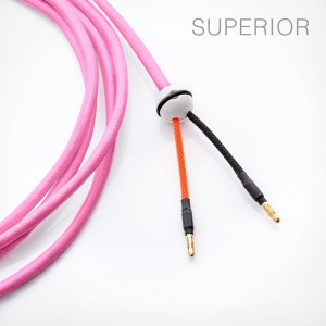Loudspeaker cable, handmade, textile cabel with porcelain ball cable splitter and banans, neon pink.